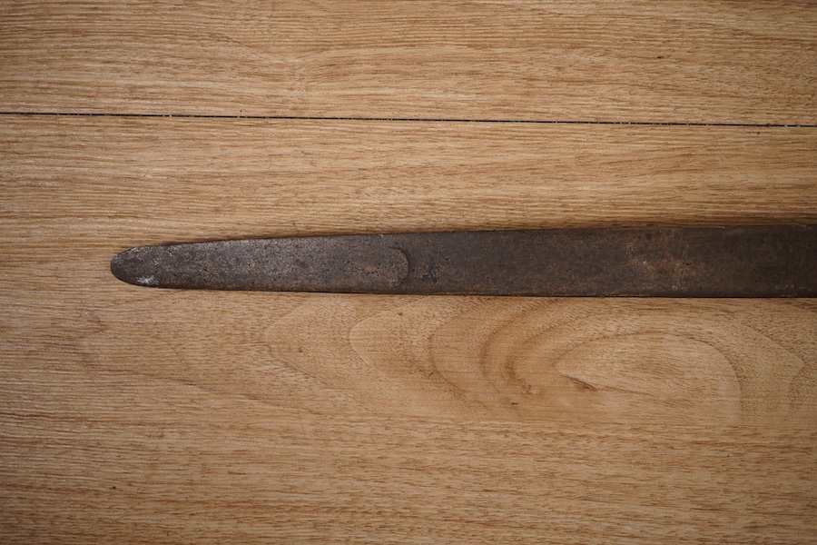 A basket hilted broadsword c.1640, later replacement blade, iron hilt of multi bars with remains of pierced guard, faceted pommel with its original wooden grip, wire covering missing, blade 79cm